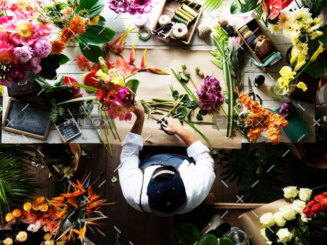 Home 37 demo-attachment-144-flower-shop-business-owner-working-service-PSEGWHL